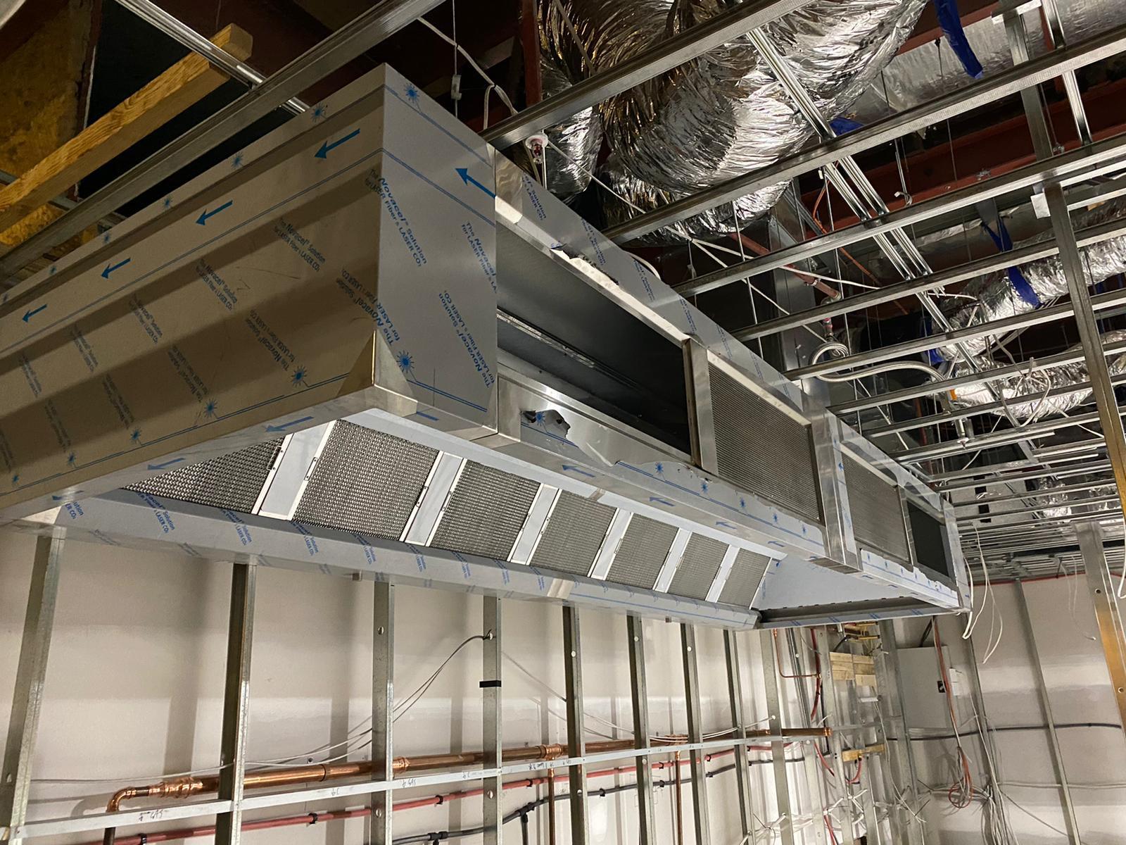 Stainless commercial exhaust canopy installation